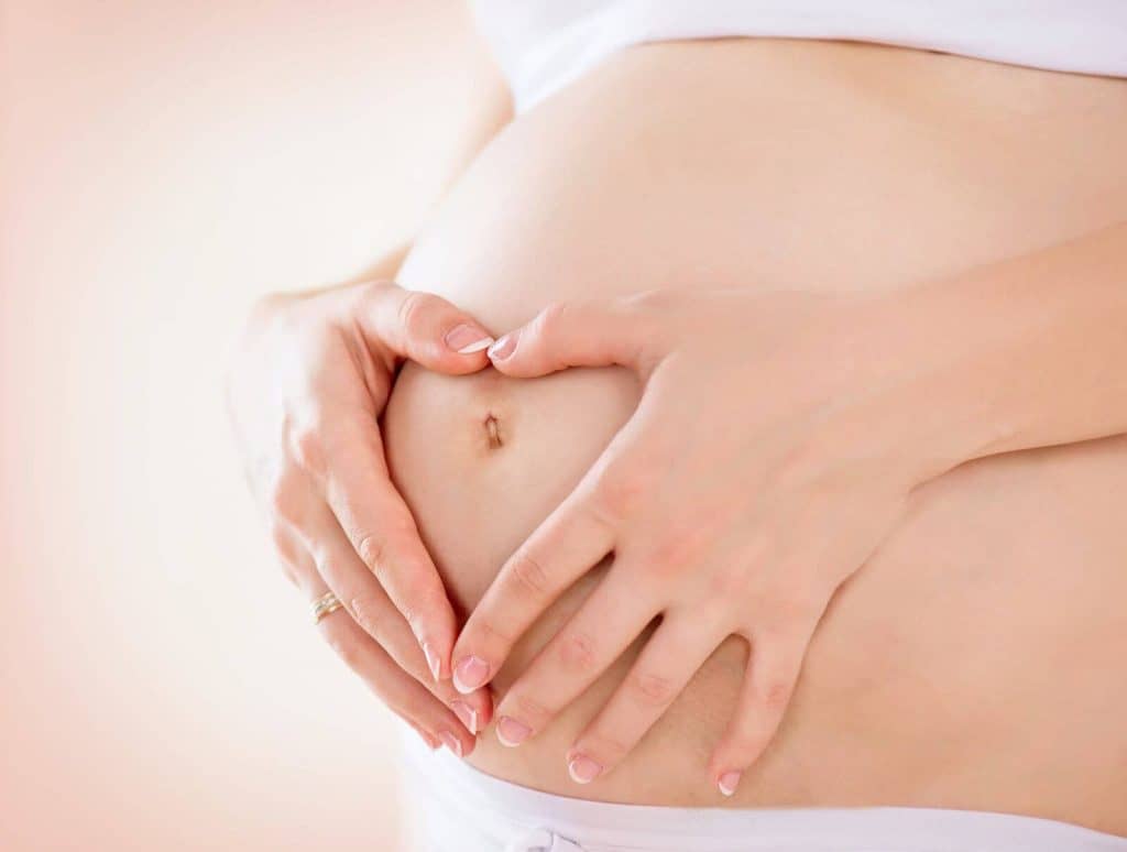 pregnant women eating some food